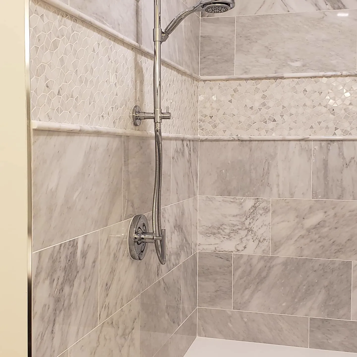 Marble shower with rain shower head and handheld sprayer